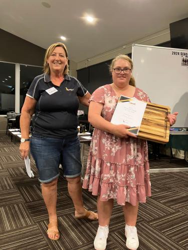 Liz-from-Scavenger-Fire-Safety-presenting-the-Volunteer-of-the-Year-2024-award-to-Keyara-Guthrie